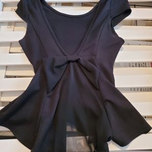 Black v cut top sheer in the middle with a bow